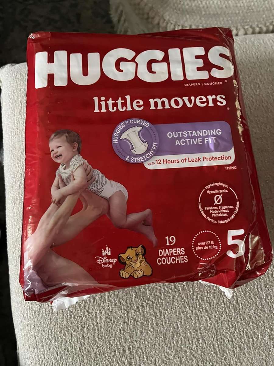 Pieluchy dla niemowląt Huggies Lion King rozmiar 5 puzzle online